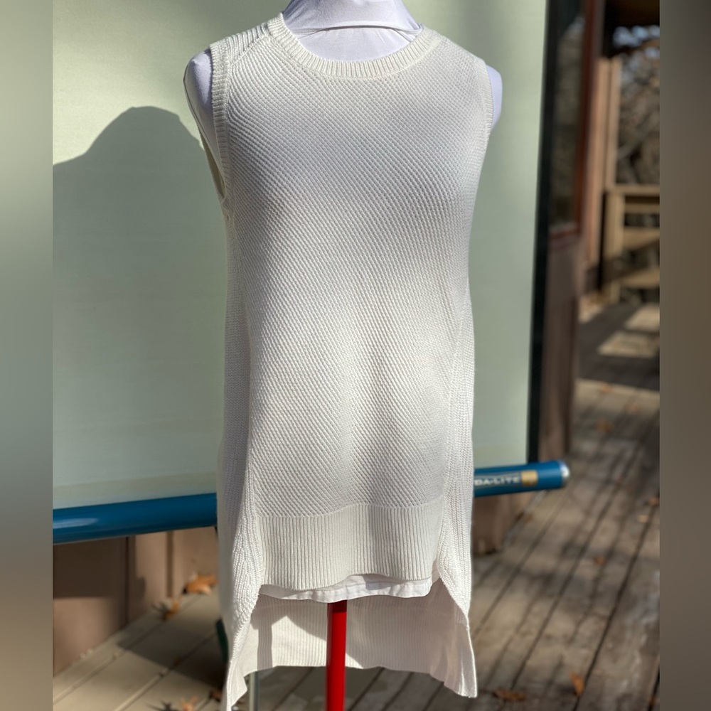 The Limited brand long sleeveless sweater vest. High-low hem. Off-white.